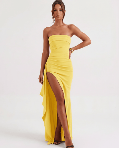 Solenne Maxi Dress by Lauven, yellow bandeau dress with dramatic side slit and asymmetrical panel design.