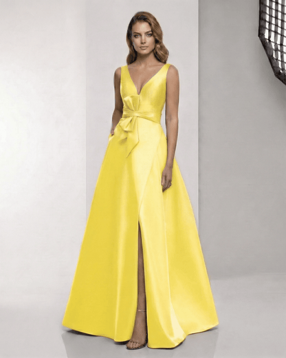 Solenne Maxi Dress - Satin A-Line yellow dress with V-neck and bow detail, by Lauven, perfect for standout occasions.
