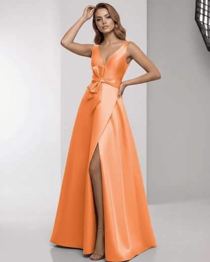 Solmira Maxi Dress - Orange Satin A-Line with Wrap Slit and Bow Waist by Lauven, perfect for formal occasions.