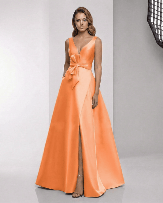 Solmira Maxi Dress - Orange Satin A-Line Maxi Dress with Bow Waist and Slit by Lauven, elegant and striking for formal occasions.