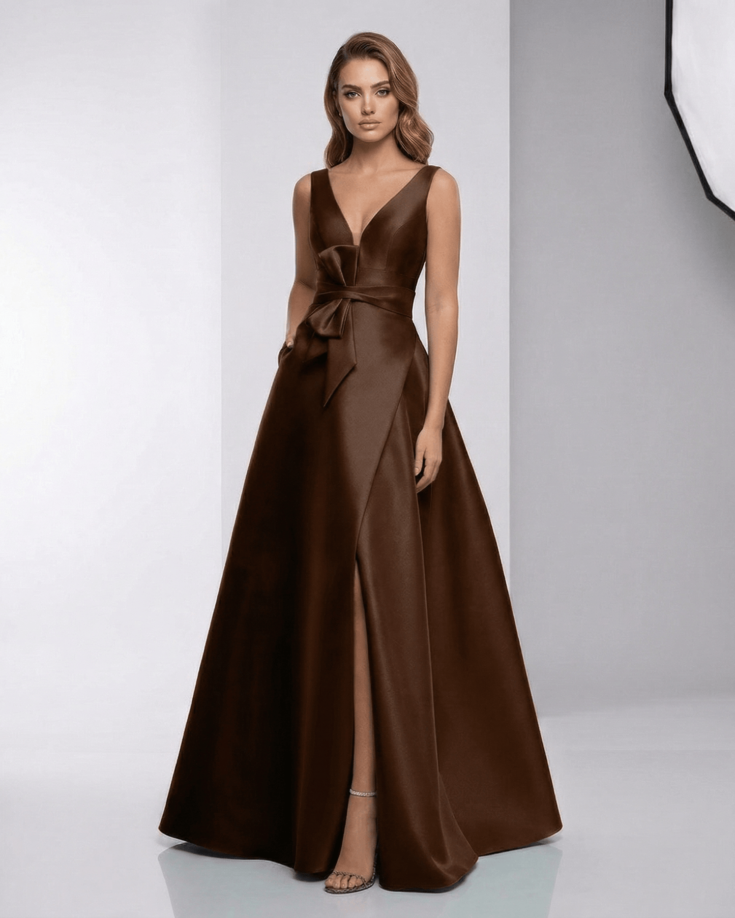 Sorrento Maxi Dress - Brown satin A-Line evening dress with V-neck, bow detail, and elegant silhouette by Lauven.