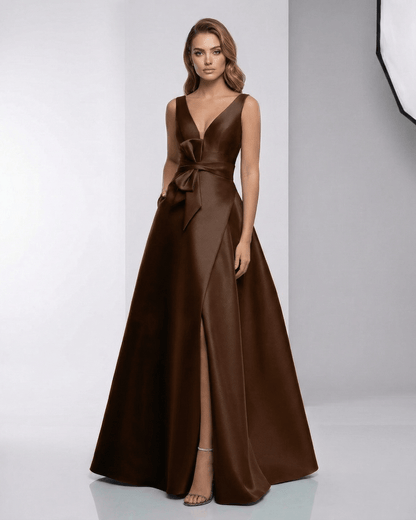 Sorrento Maxi Dress - Brown satin A-Line evening dress with V-neck, bow detail, and elegant silhouette by Lauven.