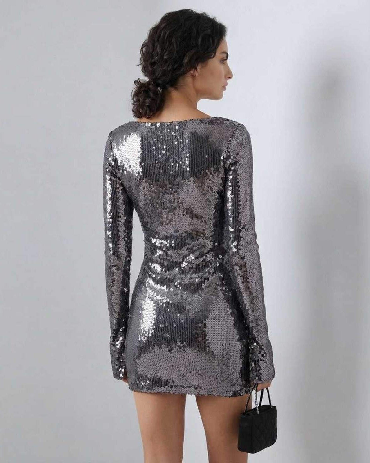 Lauven Stella Mini Dress with sequined shine and flared sleeves, showcasing a modern silhouette in glamorous style.