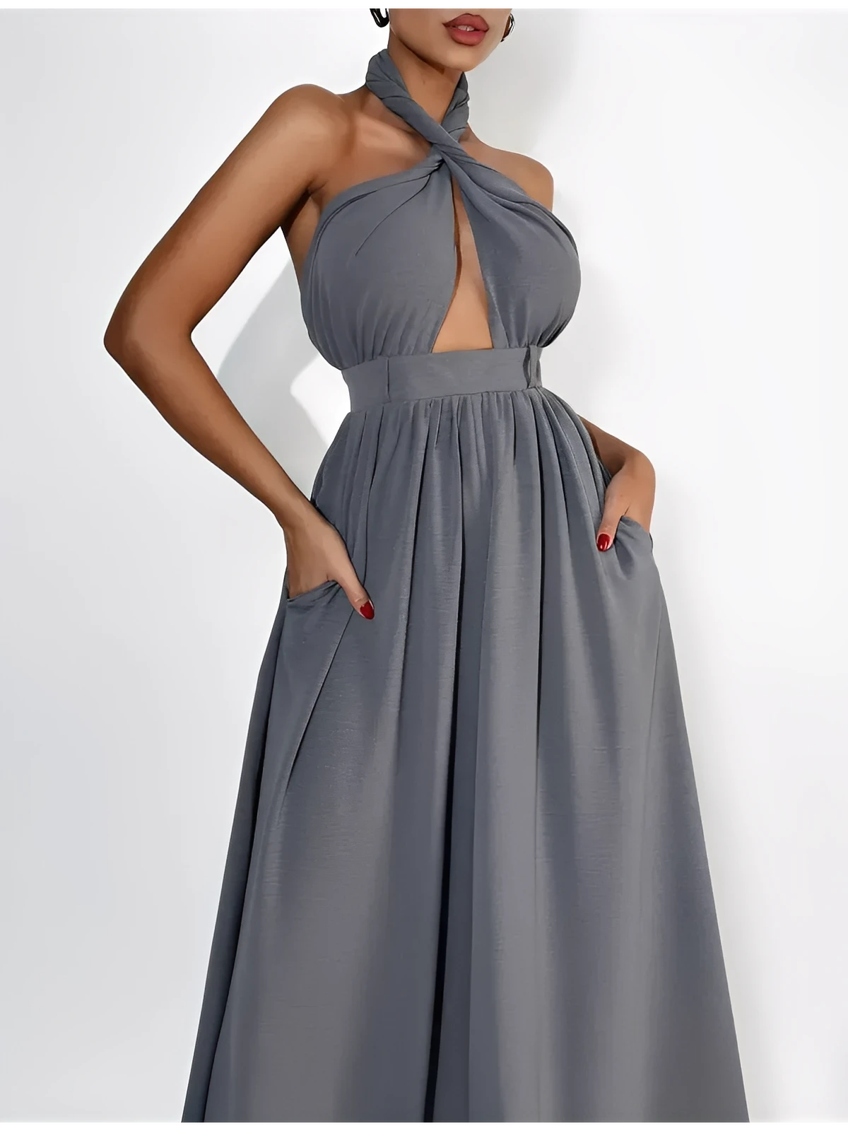 Twist Halter Jumpsuit in grey with open back and wide leg design, showcasing elegant summer fashion.