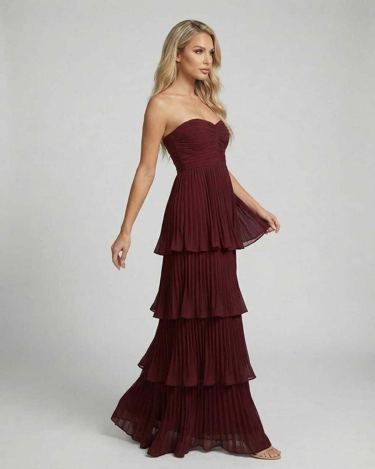 Elegant Valencia Maxi Dress by Lauven in burgundy with strapless design and pleated chiffon tiered silhouette.