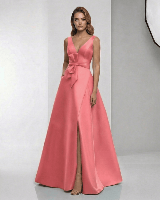 Valencia Maxi Dress: Coral satin A-line gown with deep V-neck, sleeveless design, and elegant silhouette by Lauven.