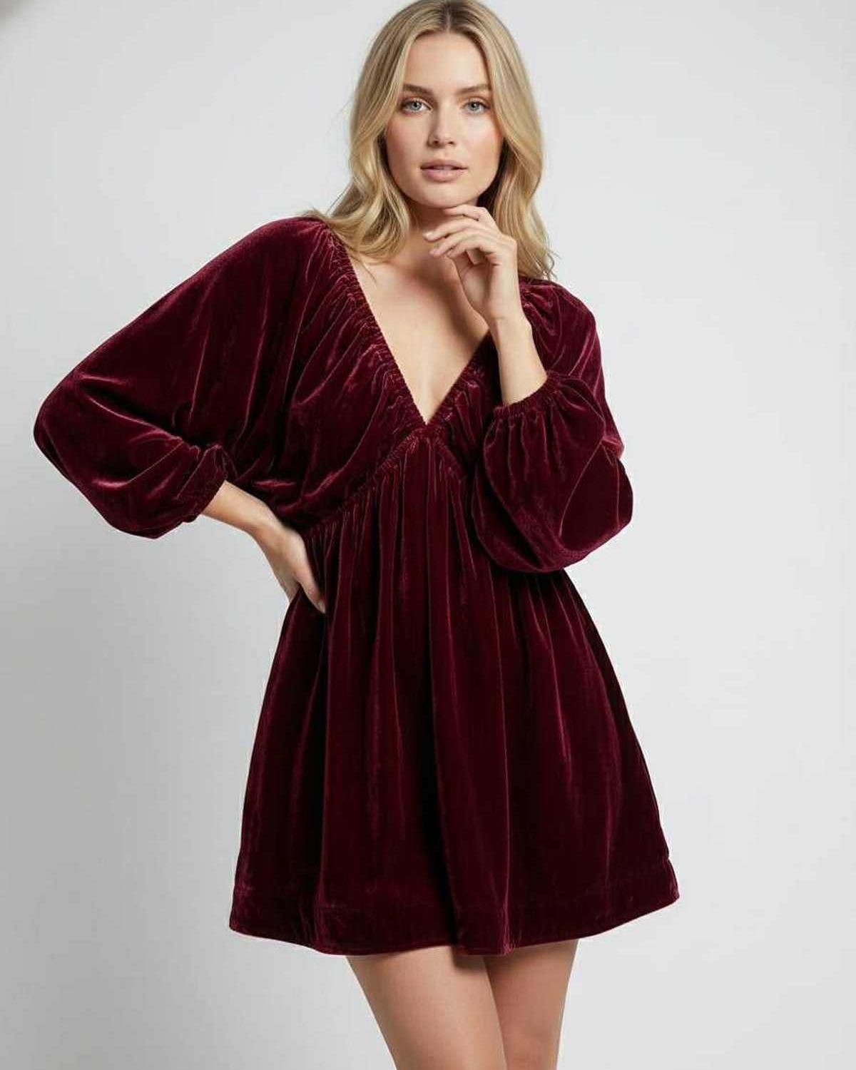 Valencia Mini Dress in burgundy velvet with long sleeves and V neck, offering a polished look by Lauven.