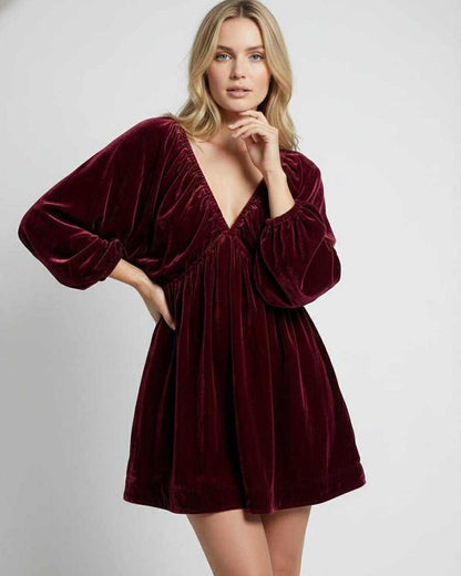 Valencia Mini Dress in burgundy velvet with long sleeves and V neck, offering a polished look by Lauven.