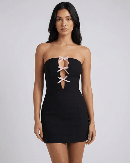 Valencia Mini Dress by Lauven featuring strapless design and bow detail in a sleek bodycon silhouette.