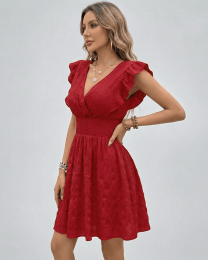 Valencia Mini Dress by Lauven in red with V-neck and smocked waist, perfect for various occasions.