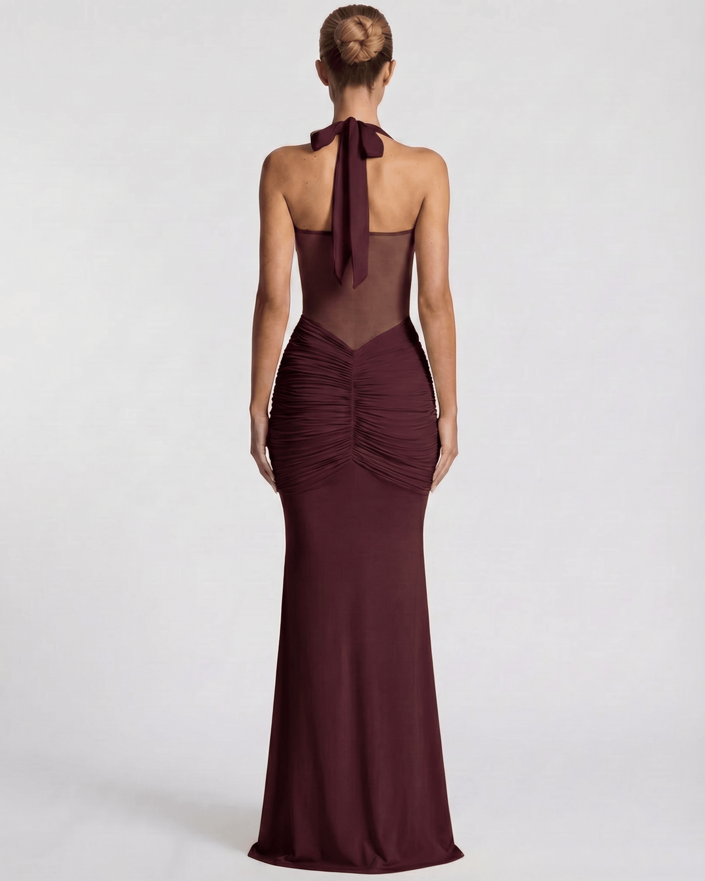 Valora Maxi Dress back view, burgundy halter design, mesh panel, mermaid silhouette by Lauven.