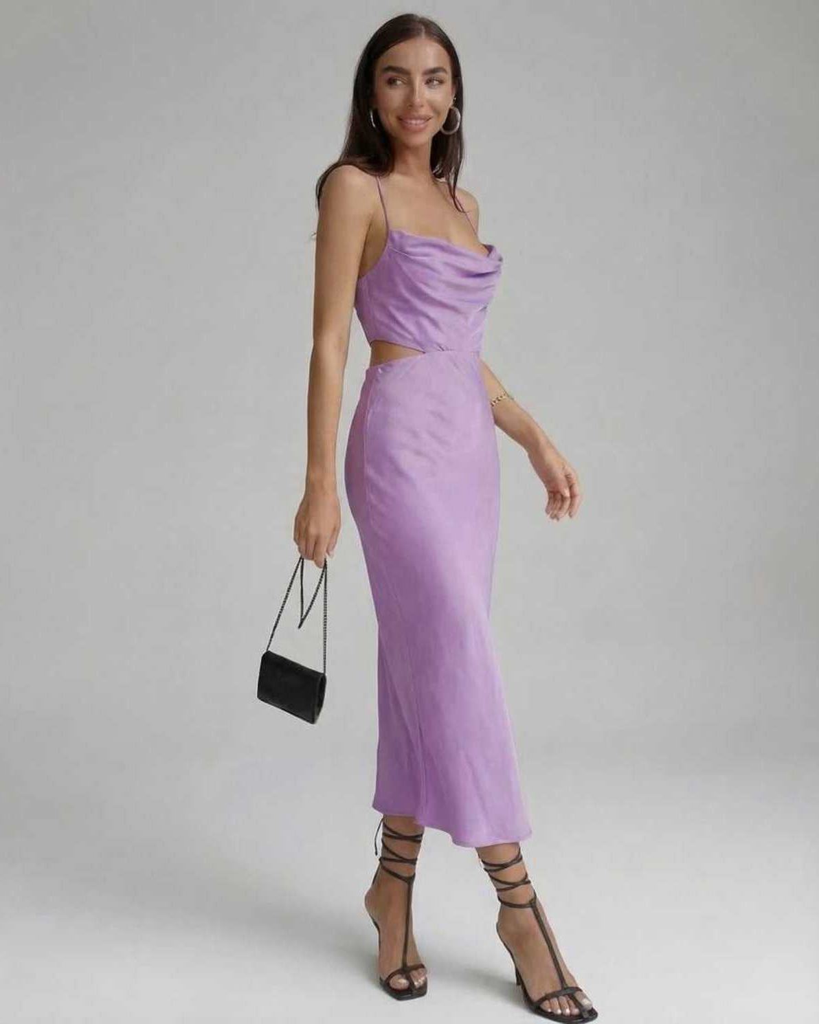 Vega Midi Dress in elegant lilac color, showcasing a sleeveless silhouette and modern design by Lauven.