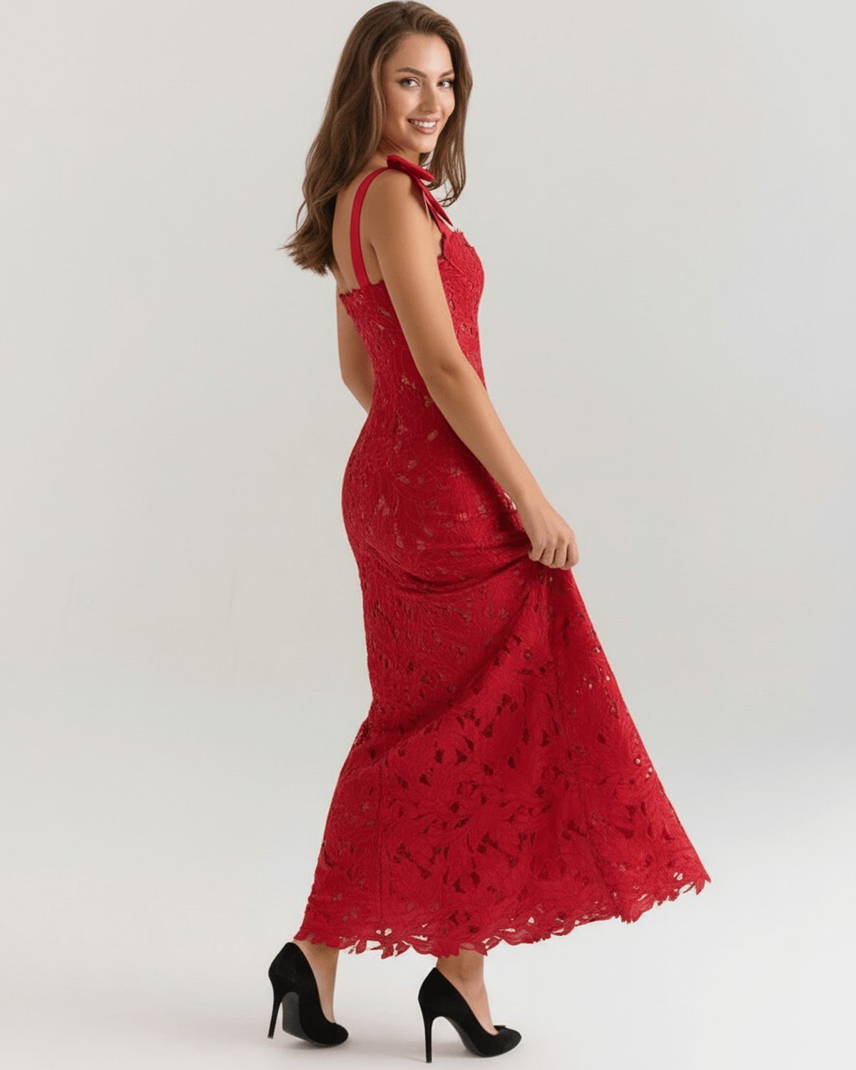 Model wearing Velmira Maxi Dress, a stunning red lace maxi dress with square neckline and shoulder ties.