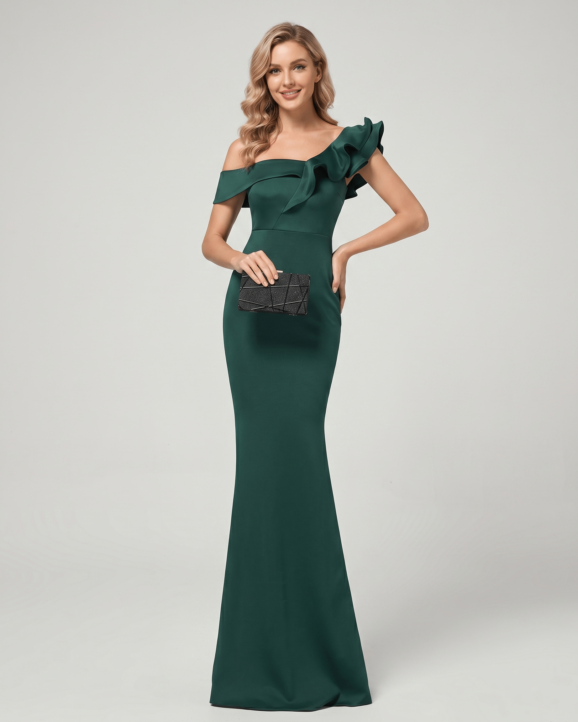 Model wearing Velmora Maxi Dress with off-shoulder neckline and asymmetrical ruffle by Lauven, styled elegantly.
