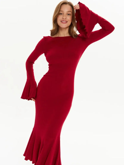Red Velvet Flare long sleeve midi dress with flared cuffs and fishtail hem, perfect for formal events or weddings.