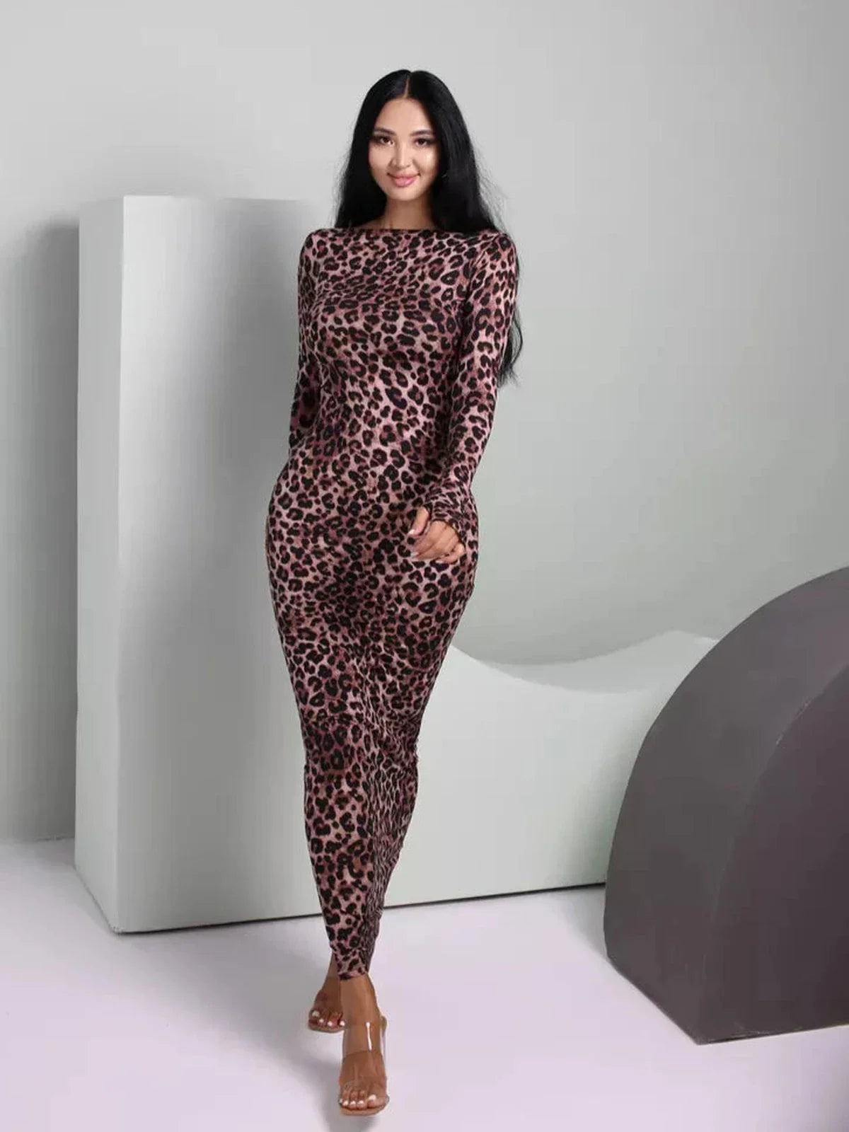 Velvet Wild Maxi Dress in leopard print, showcasing a form-fitting design that exudes elegance and confidence.