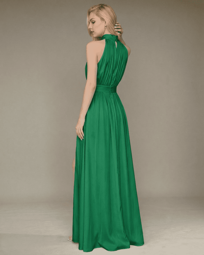 Back view of the Lauven Verdant Maxi Dress featuring a sleeveless turtleneck and elegant green fabric.