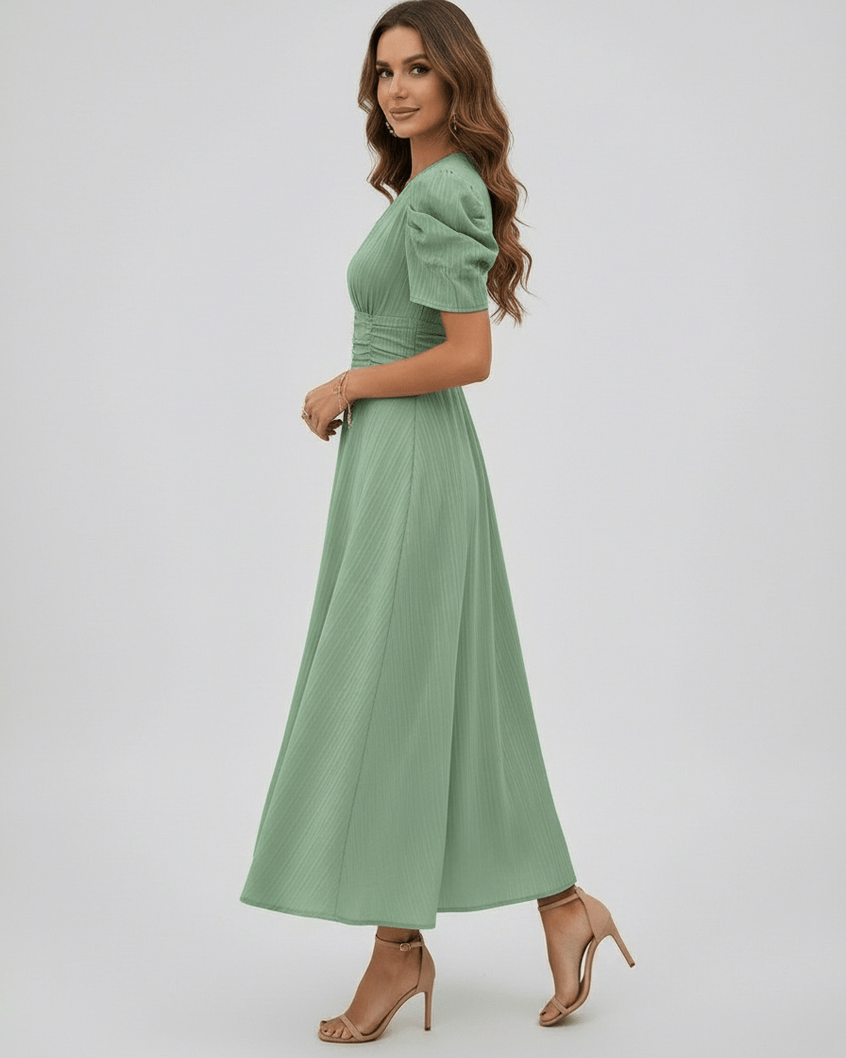 Verdant Midi Dress featuring sage green fabric, puff sleeves, and a flattering silhouette, perfect for weddings by Lauven.