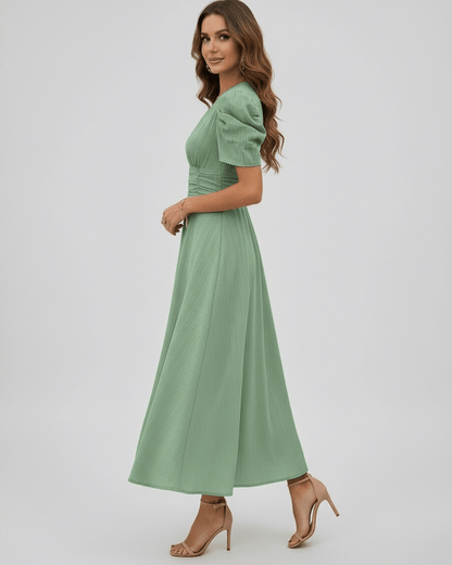 Verdant Midi Dress featuring sage green fabric, puff sleeves, and a flattering silhouette, perfect for weddings by Lauven.