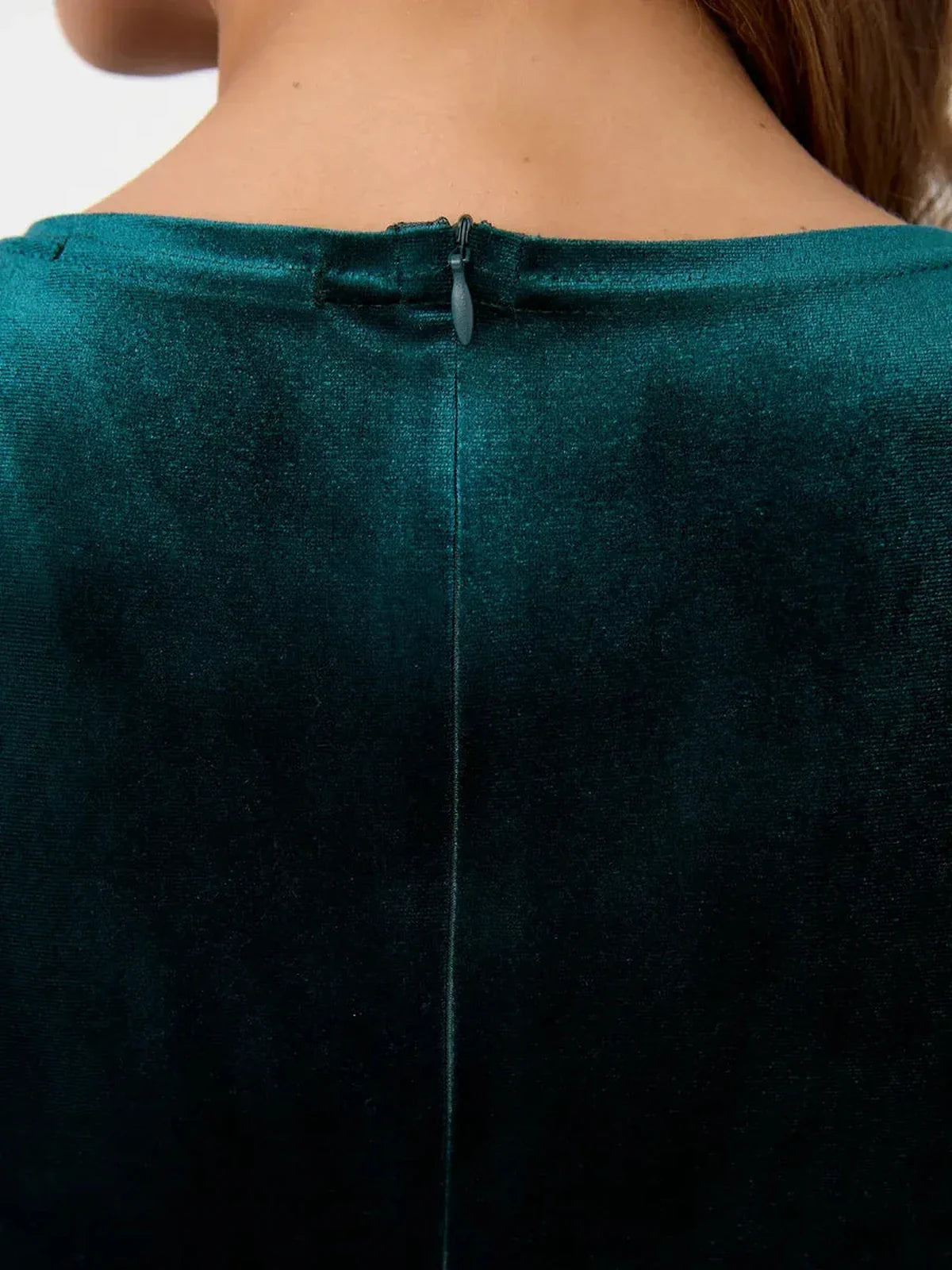 Back view of the Verde Luxe Maxi Dress showcasing the zipper detail and plush emerald velvet texture.