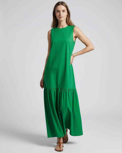 Verde Midi Dress showcasing a relaxed A-line silhouette in vibrant green, perfect for casual summer style by Lauven.