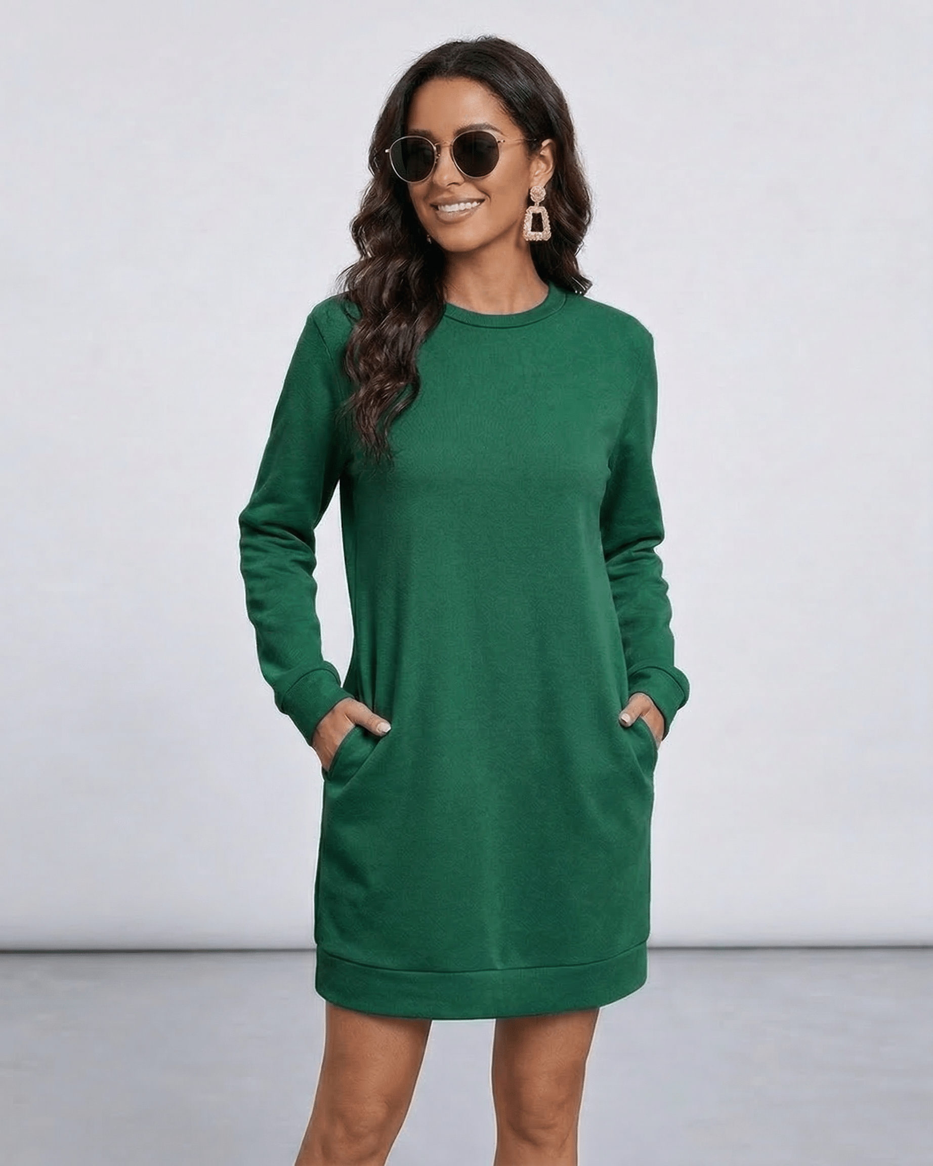 Verde Mini Dress by Lauven in emerald green, showcasing casual style with pockets and a crew neckline.