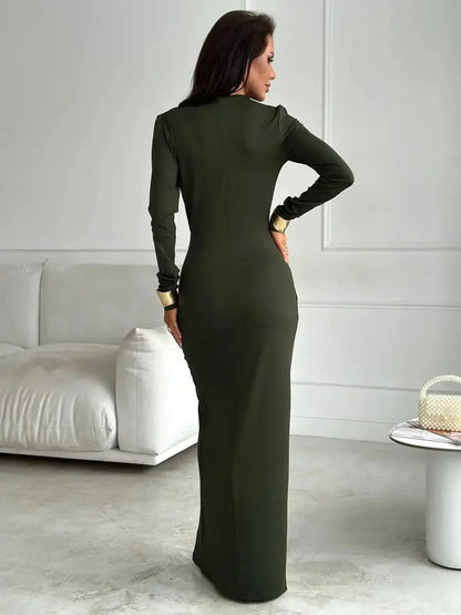Verde Muse Maxi Dress in deep green, showcasing a sculpted fit and elegant design from the back, perfect for elevated occasions.