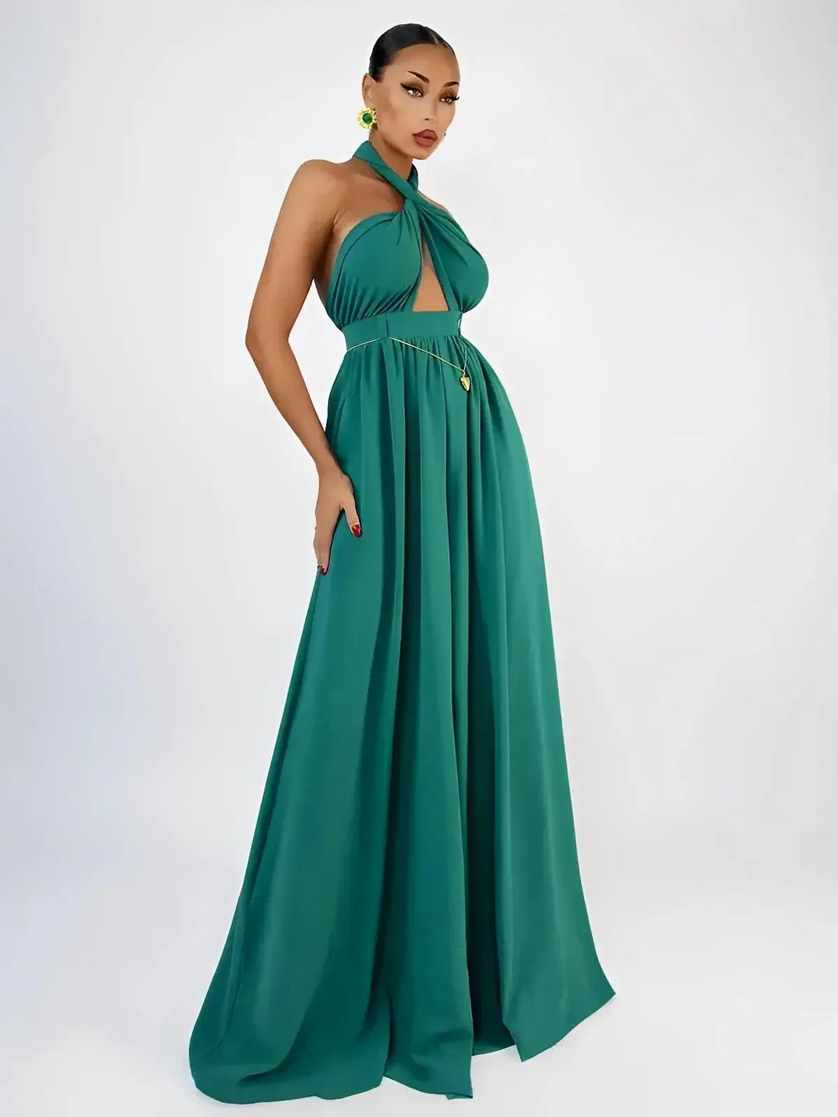 Verona Jumpsuit by Lauven featuring halter neck, open back, wide leg design in emerald green.