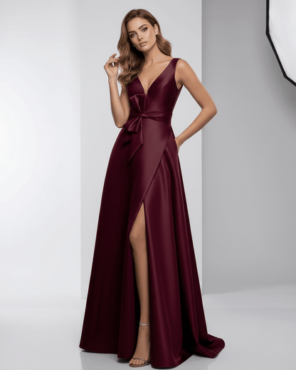 Verona Maxi Dress - Elegant burgundy satin A-Line V-neck evening dress by Lauven with a stylish slit detail.