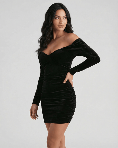 Lauven Verona Mini Dress - Black Velvet Off Shoulder Mini Dress with Long Sleeves showcasing elegant silhouette.