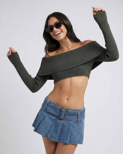 Model wearing the Verona Top by Lauven, an off shoulder crop top, paired with a denim skirt.