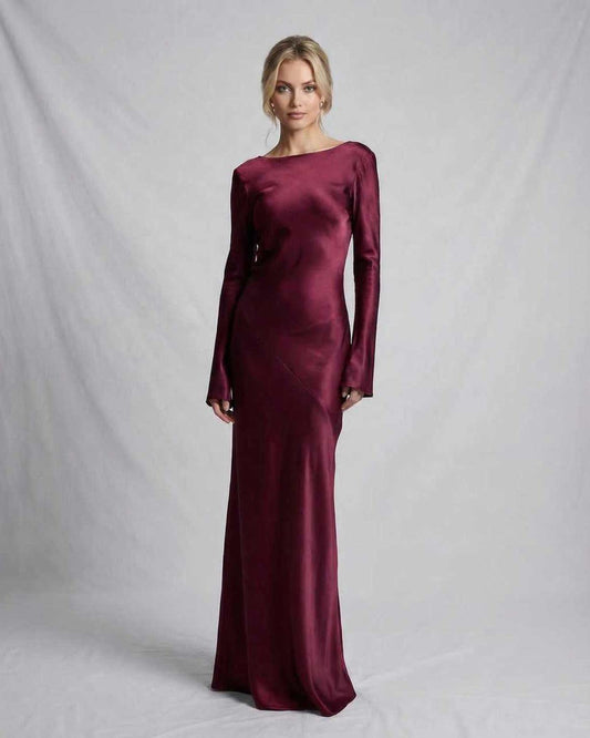 Vesper Maxi Dress by Lauven in rich burgundy satin, featuring a slim fit silhouette and long sleeves.