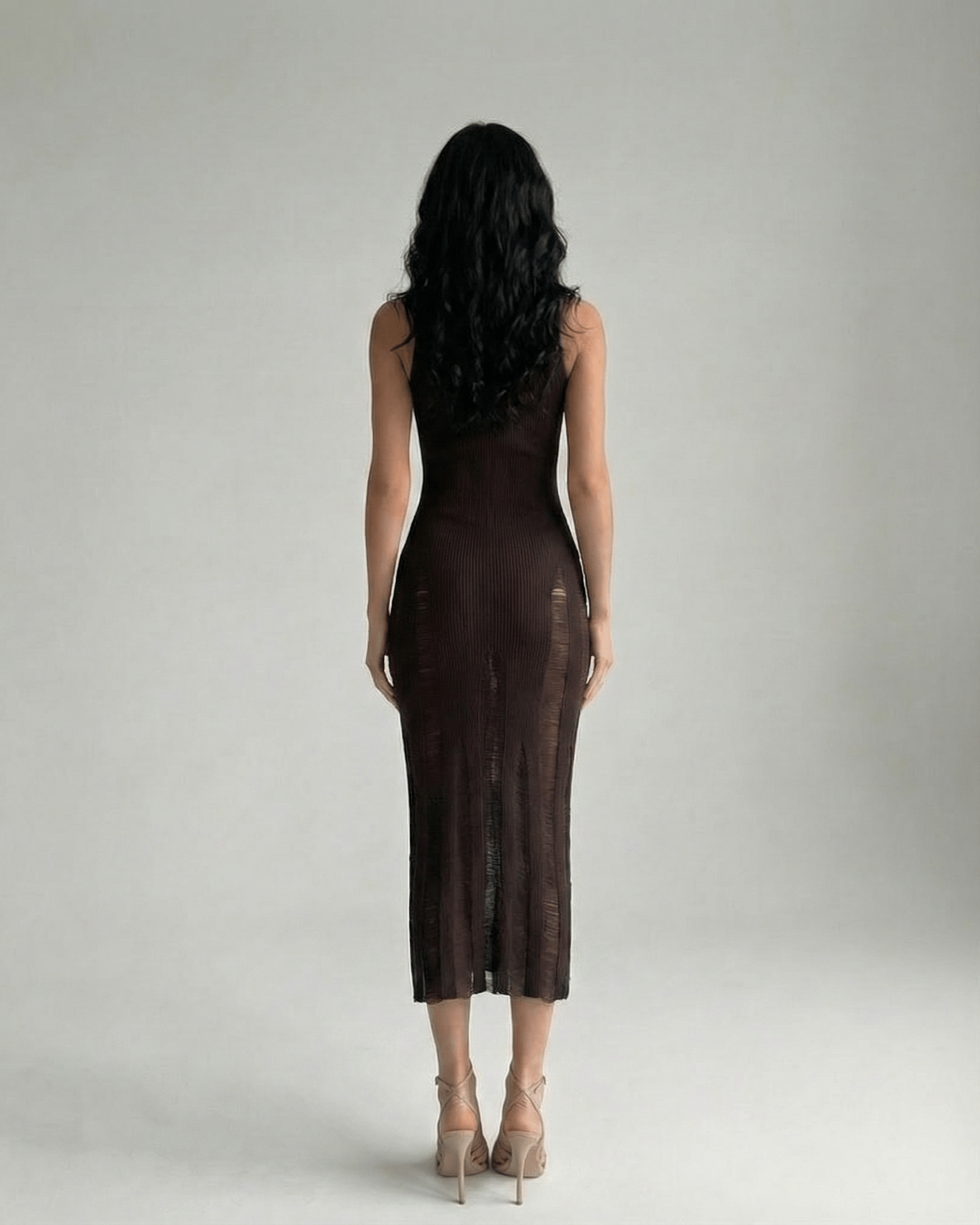 Vesper Midi Dress showcasing a dark brown bodycon fit, sleeveless design, enhancing a refined silhouette by Lauven.