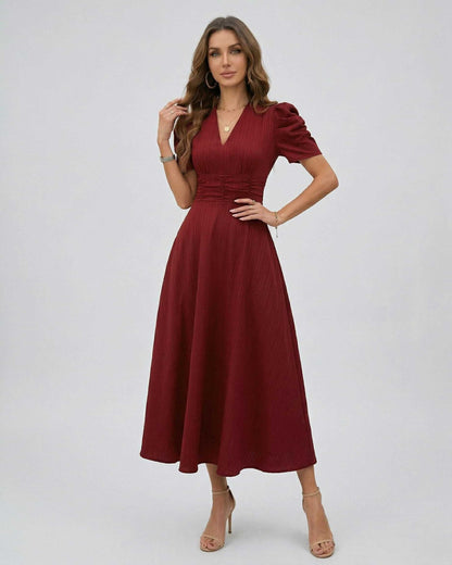 Vesper Midi Dress in red with puff sleeves and V-neckline, perfect for wedding guests and formal occasions by Lauven.