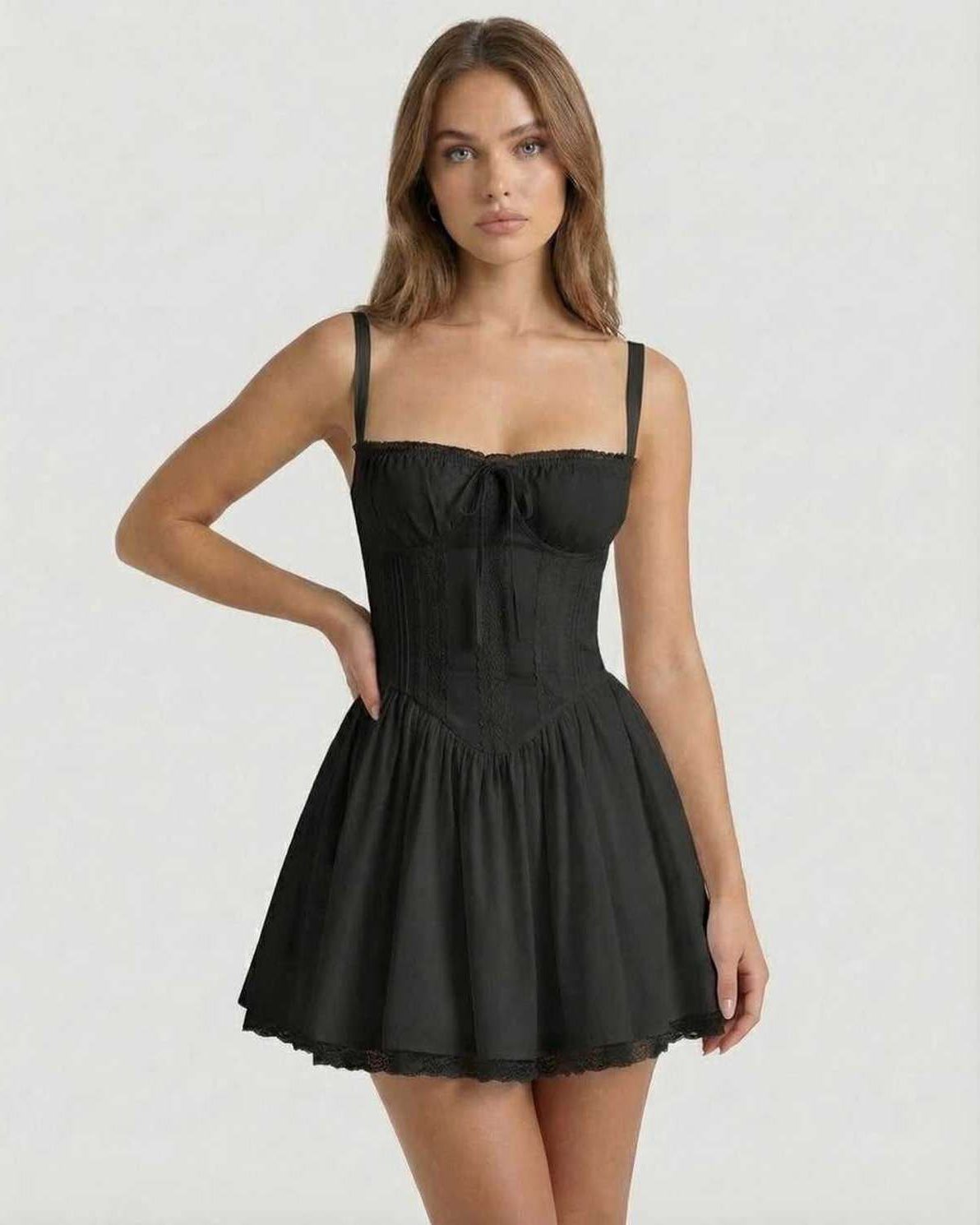 Vesper Mini Dress - Black corset style with lace trim and A-line skirt from Lauven, perfect for modern sophistication.