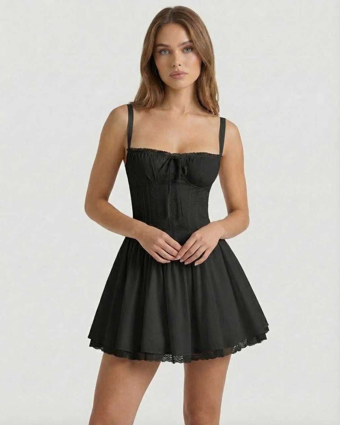 Vesper Mini Dress – Black corset style mini dress with lace trim and A-line skirt by Lauven, offering modern tailoring and comfort.