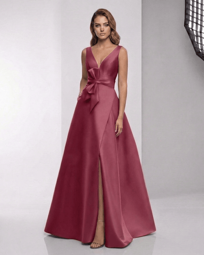 Virelle Maxi Dress in deep red satin with wrap slit, A-line silhouette, by Lauven, showcasing elegance and modern style.