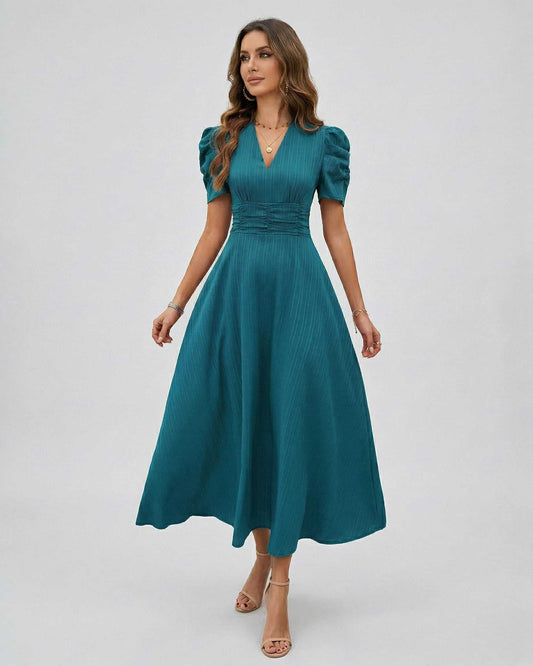 Zahara Midi Dress in teal, featuring puff sleeves and a flattering V-neckline by Lauven, perfect for weddings or cocktail events.