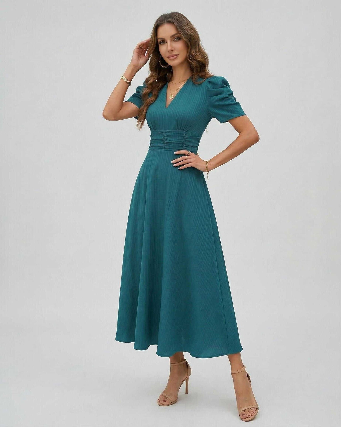 Zahara Midi Dress in teal, featuring sculpted puff sleeves and a cinched waist, perfect for elegant occasions by Lauven.