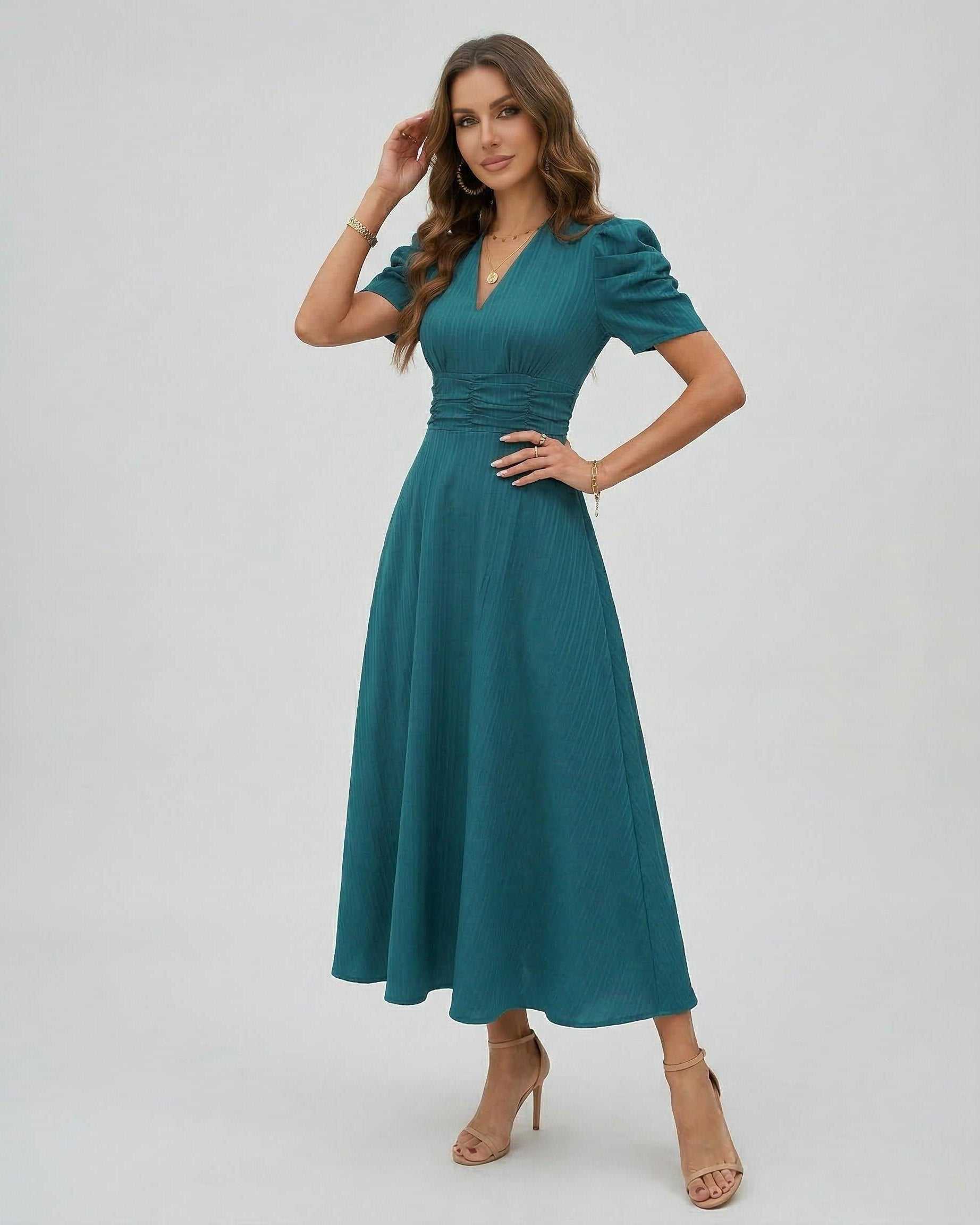 Zahara Midi Dress in teal, featuring sculpted puff sleeves and a cinched waist, perfect for elegant occasions by Lauven.