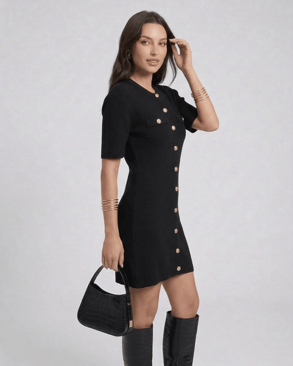 Zara Mini Dress by Lauven in black with a chic button closure and sleek straight silhouette, perfect for casual styling.