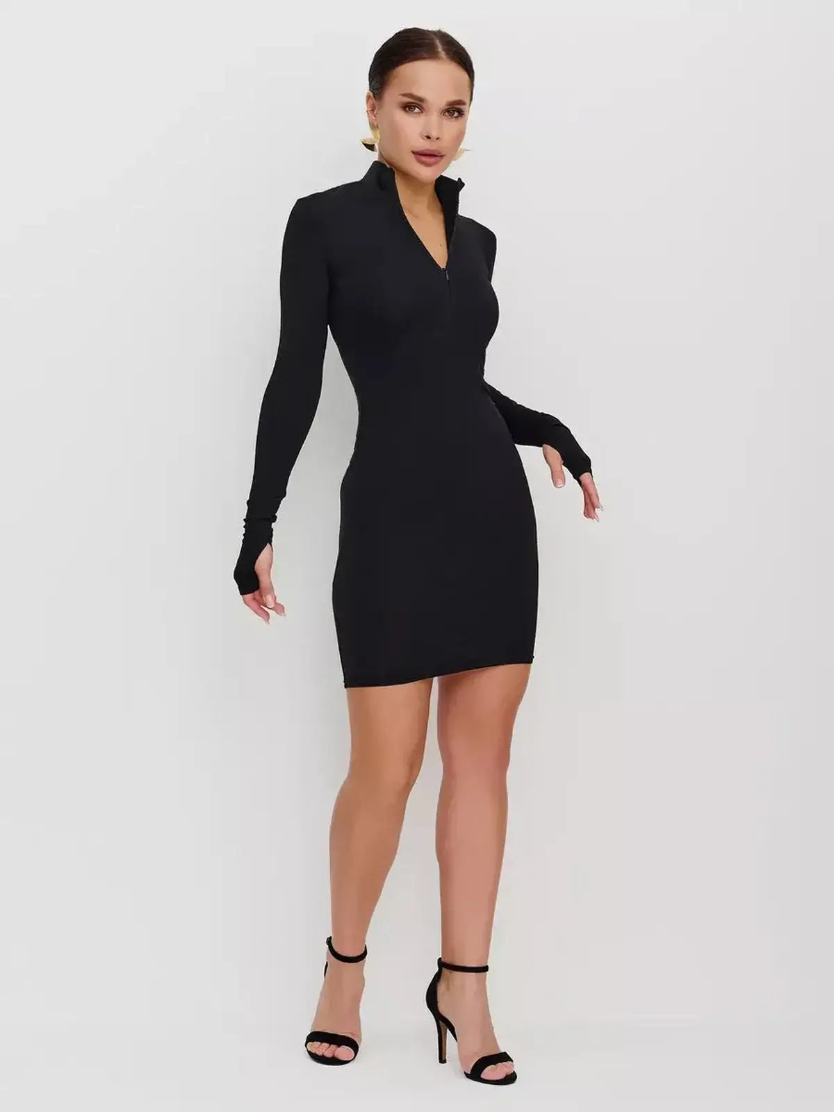 Sleek black Zip Form Mini Dress with long sleeves and zip-front closure, perfect for summer and cocktail occasions.